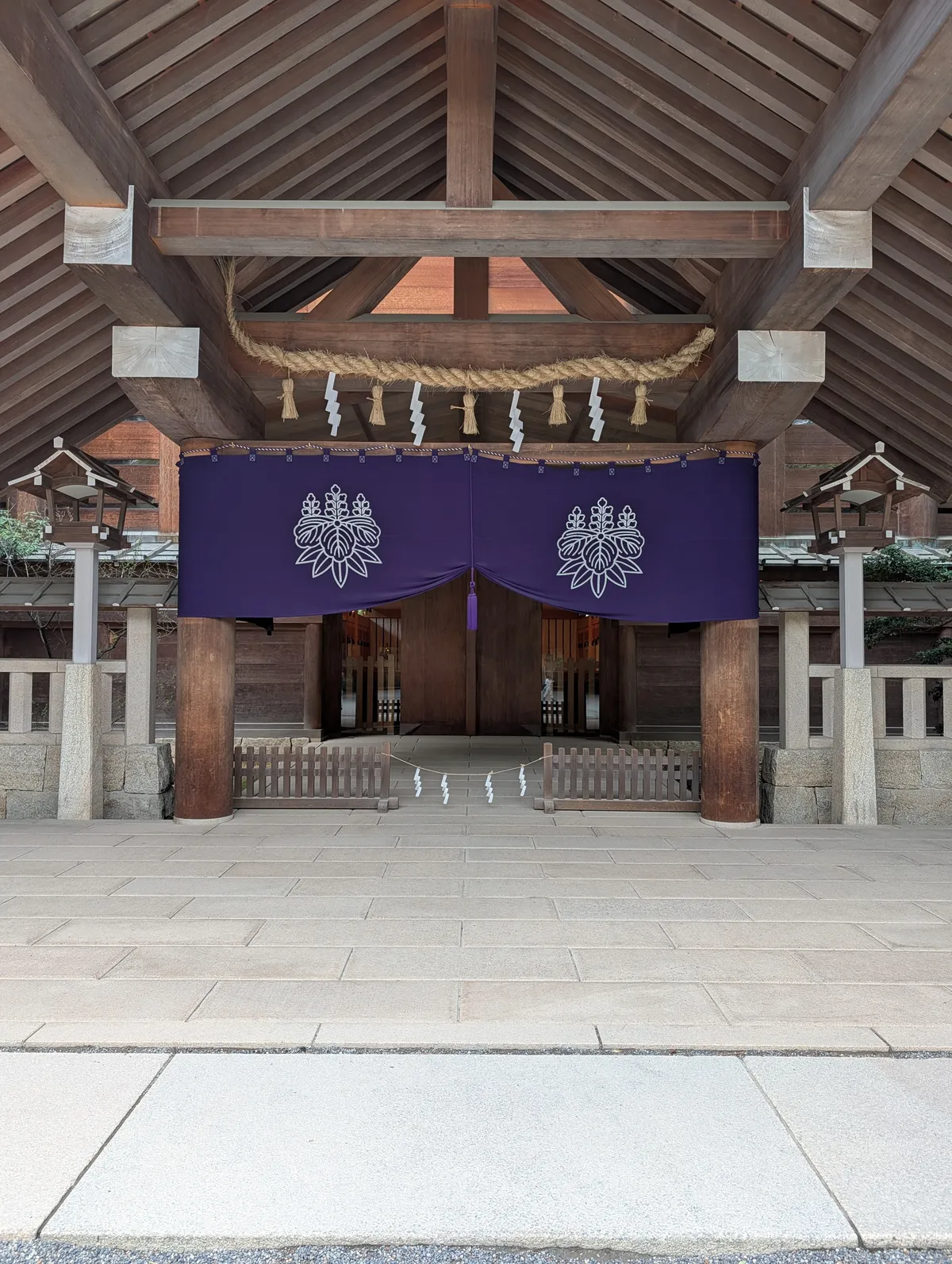 The main shrine gate at Atsuta Jingu in Nagoya, surrounded by ancient cedar trees