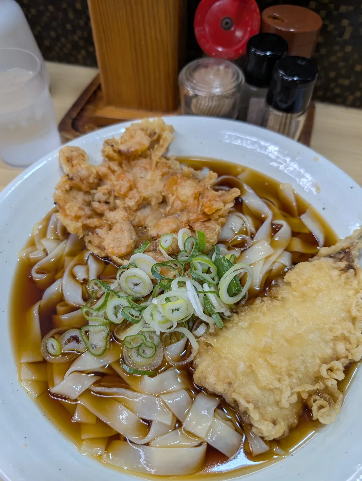 Kishimen flat noodles with tempura in a clear dashi broth