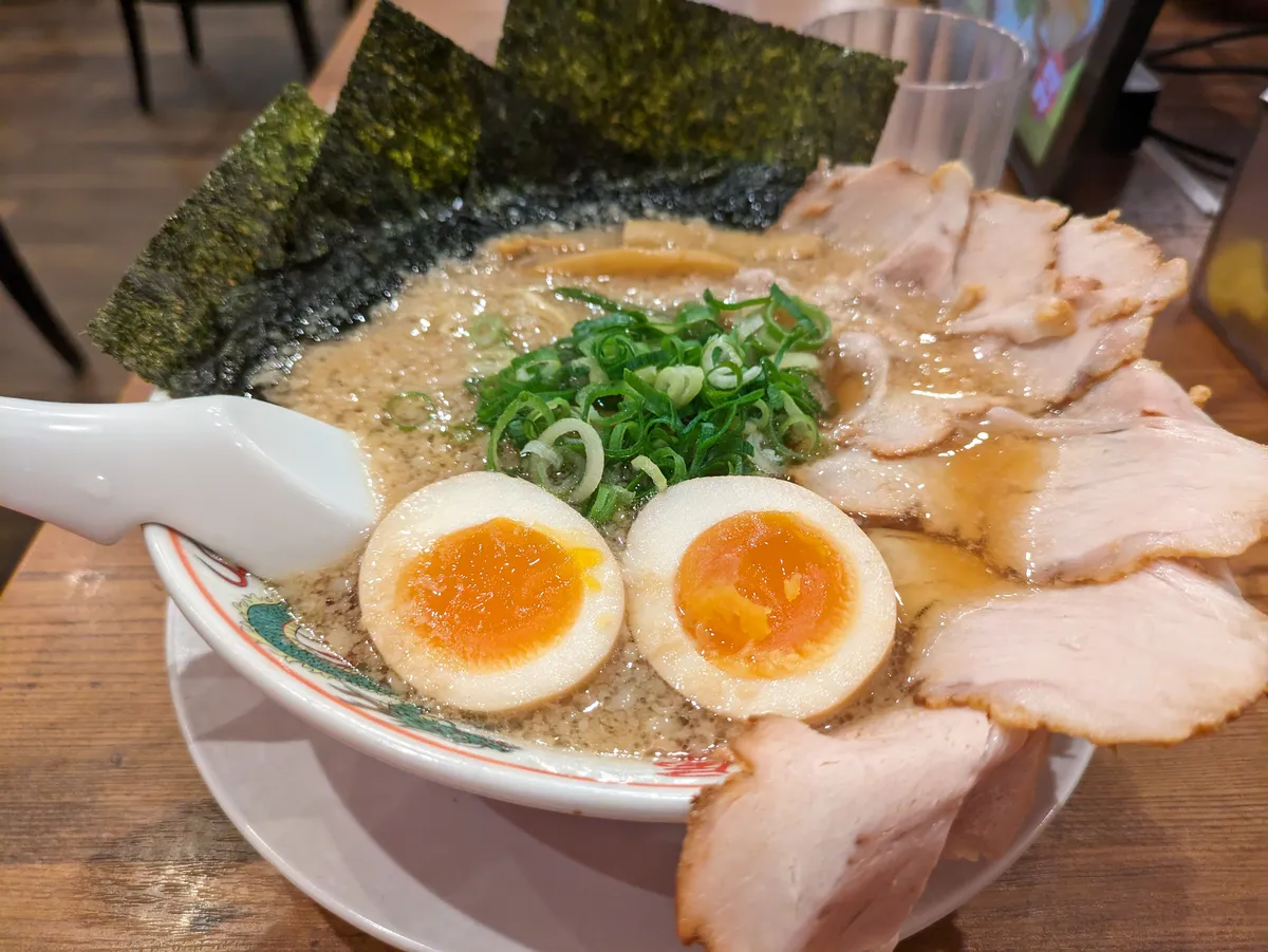 Rich tonkotsu ramen with thick chashu pork slices at a Nagoya ramen shop