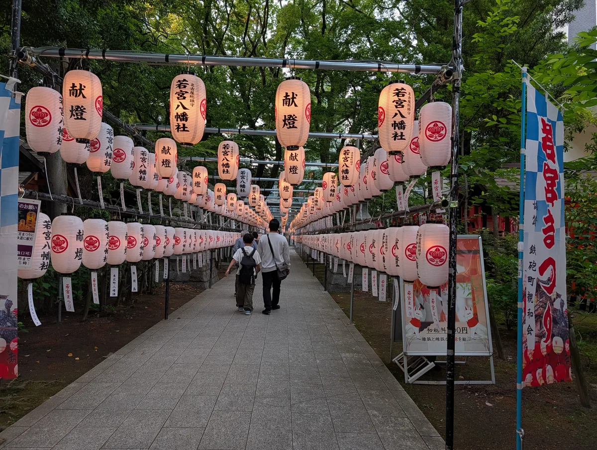 Paper lanterns lining the approach to Wakamiya Hachimansha shrine in central Nagoya during the Wakamiya Matsuri